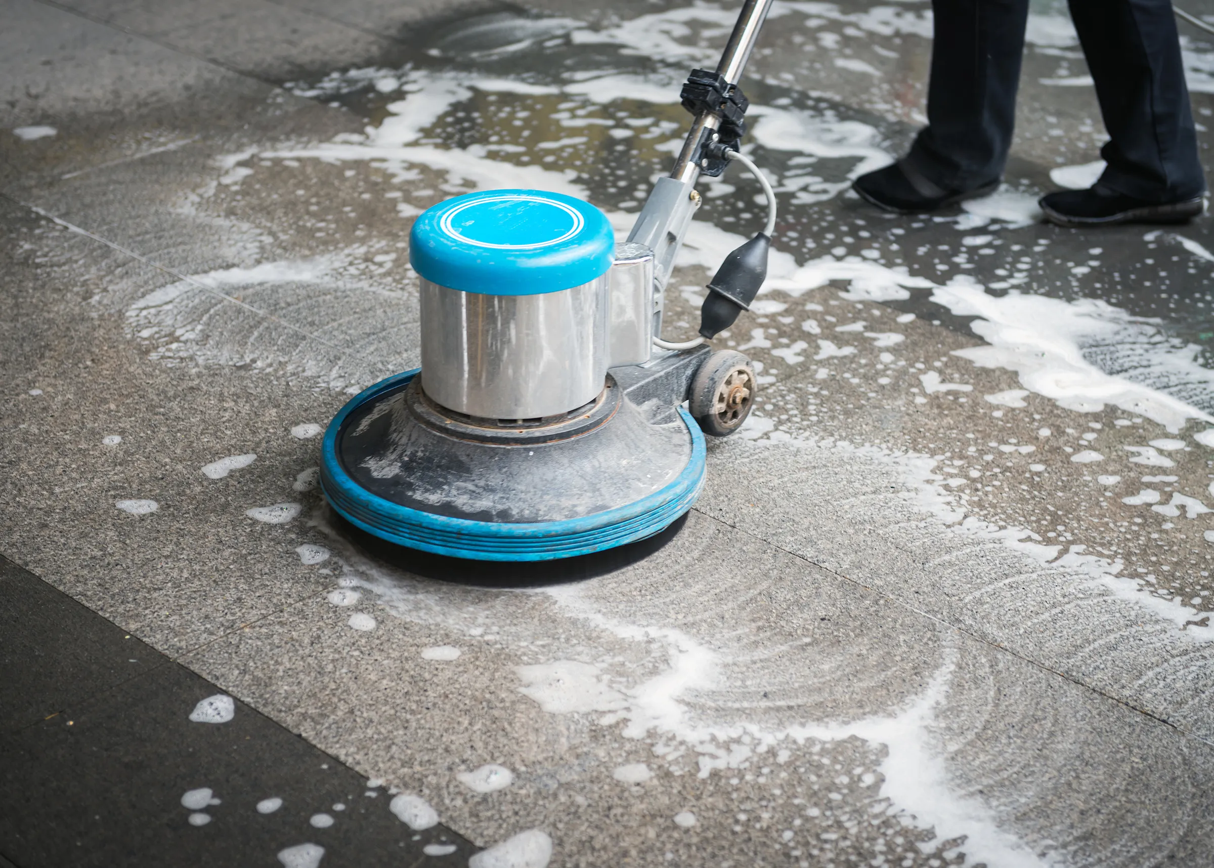 Detail of clean commercial tile floor with bright grout lines